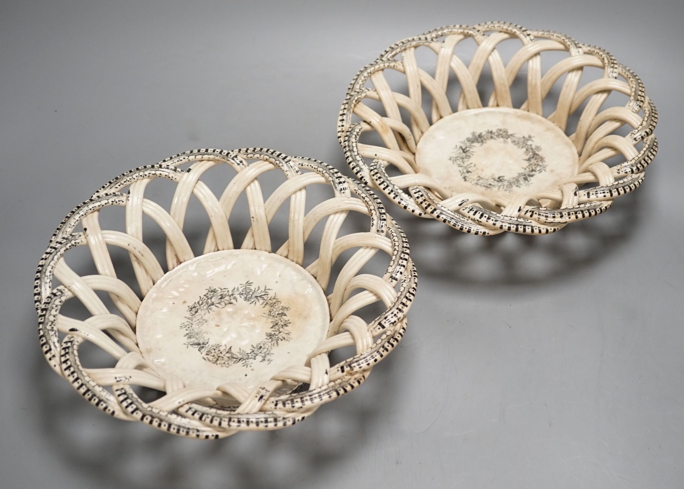 A pair of mid 19th century ironstone baskets, ex Charleston Manor sale - 26cm diameter